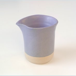 Lille fl�de/m�lkekande i sk�n lavendelglasur