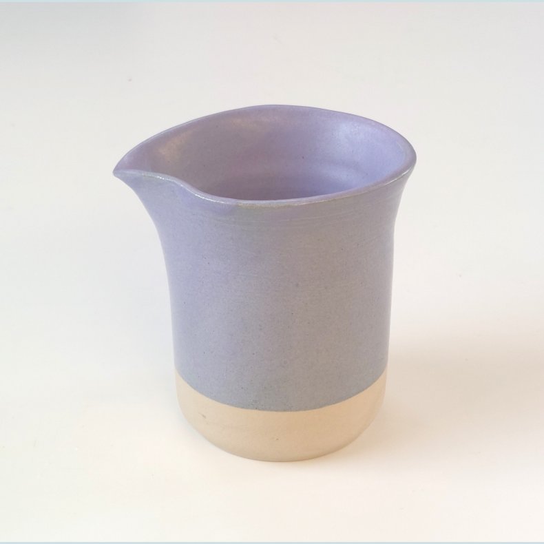 Lille fl�de/m�lkekande i sk�n lavendelglasur