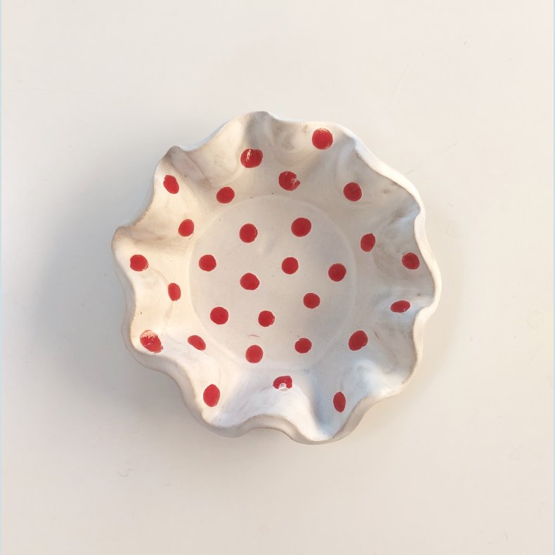 Fyrfadsstage med r�de prikker